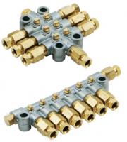 Многоканальные распределители смазки